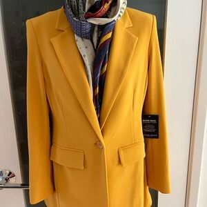 Beautiful fitted, casual blazer, new with tags, style over dresses or pants.